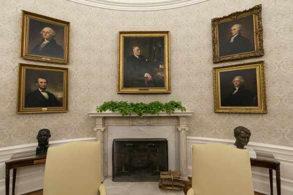 The artworks include a pairing of former President Franklin D. Roosevelt over the mantle of the fireplace.