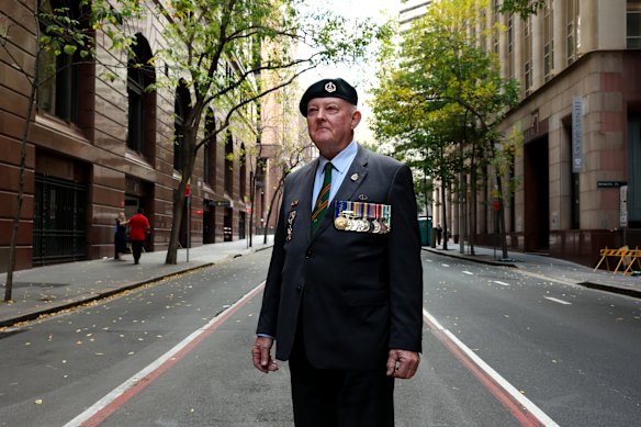 Vietnam veteran Rod White, a former RSL president, gets ready to march.