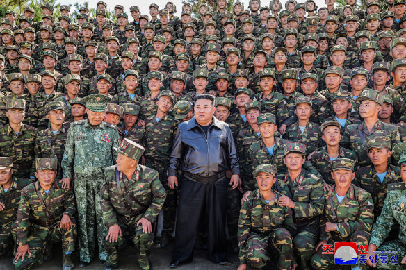 North Korea’s leader, Kim Jong-un (centre), posing with troops during an inspection at a training base of the Korean People’s Army’s special operations forces in the western region, at an undisclosed location in North Korea.