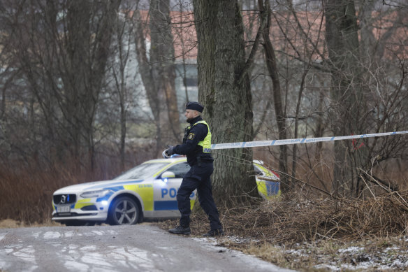 Police cordon off an area near Risbergska School in Orebro after the shooting. 