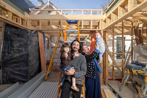 Architect Anthony St John Parsons with wife Laura Cashman and sons Mathias and Miro at the site of their home under construction. 