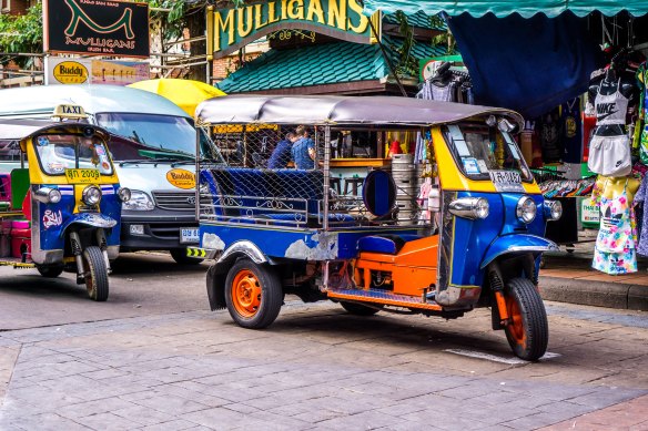 Travelling by tuk tuk.