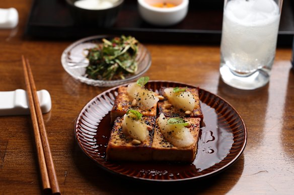 Dubu jorim (braised tofu with homemade kimchi).