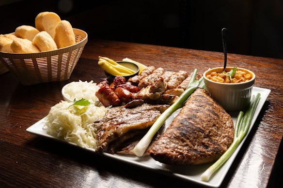 Meat platter with kebaci and sharska (cheese stuffed patty).