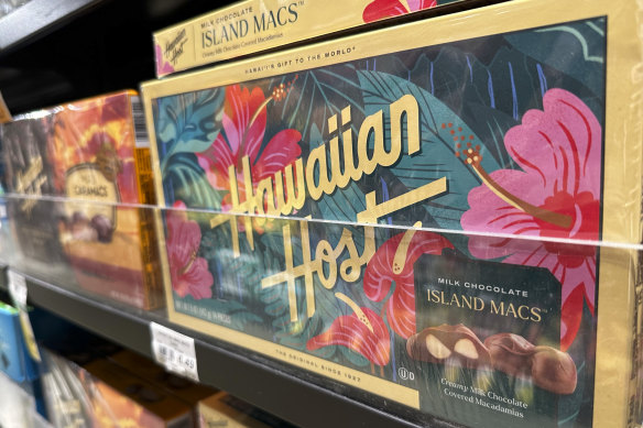 For decades, tourists to Hawaii have taken home gift boxes of the islands’ famous chocolate-covered macadamia nuts for friends and family. A new law may now force companies to disclose where their nuts come from on packaging.