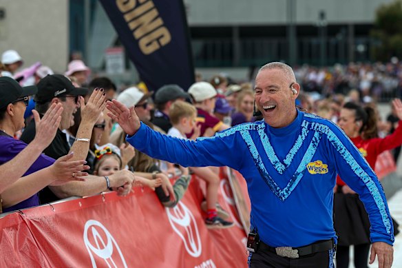 Blue Wiggles Anthony has a field day at the grand final parade.