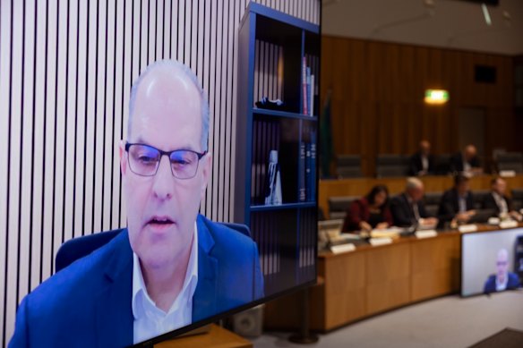 Lloyd Grimshaw, director of Plymouth Brethren Christian Church, appears via video link at the Joint Standing Committee on Electoral Matters.