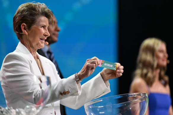 Inaugural Matildas captain Julie Dolan, who holds cap No.1, at the FIFA Women’s World Cup draw last year.