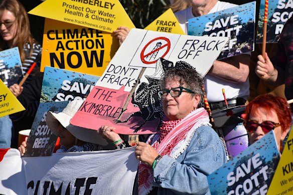 Protesters lined the steps of parliament on Friday morning after Cook’s comments. 