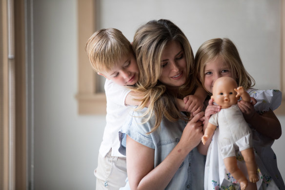 Eve Wiley, who learned through DNA testing that her biological father was her mother's fertility doctor, with her children Hutton and Scarlett at her home in Dallas.