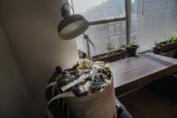 A bag of rubbish sits near the window. Spodek says he has not taken out the rubbish since 2019, having not gathered enough non-compostables and non-recyclables during his efforts to reduce waste to near zero.