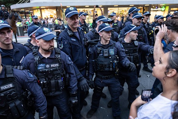 Police and protesters face off on Monday.