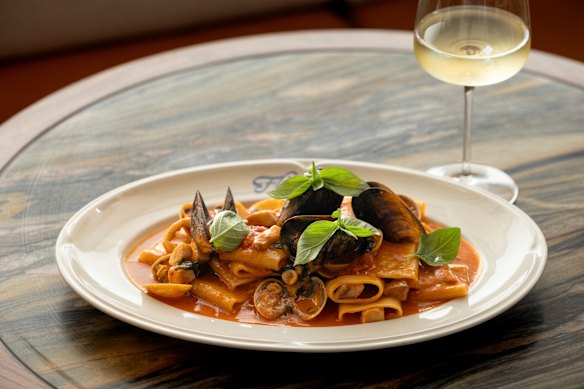 Paccheri allo scoglio with mussels, clams, squid and fish.