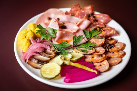 LP’s charcuterie with house-made pickles and crispy chilli oil. 