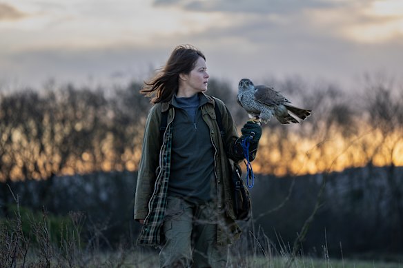 Claire Foy as Helen Macdonald, with goshawk Mabel, in H is for Hawk.