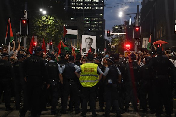 Violence arose when protesters attempted to march on George Street and were blocked by police.