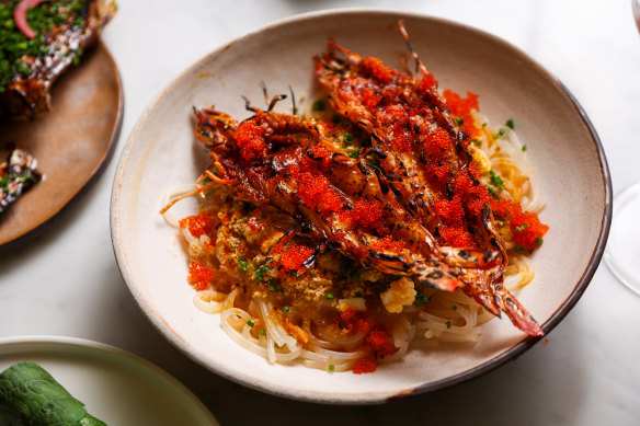 King prawn pancit palabok combines charcoal-grilled prawns and rice vermicelli.