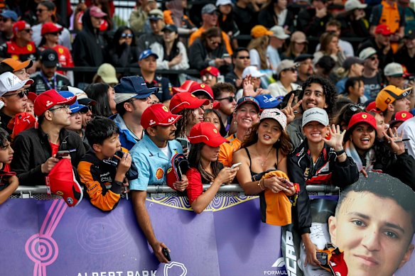 Eager fans wait for autographs.