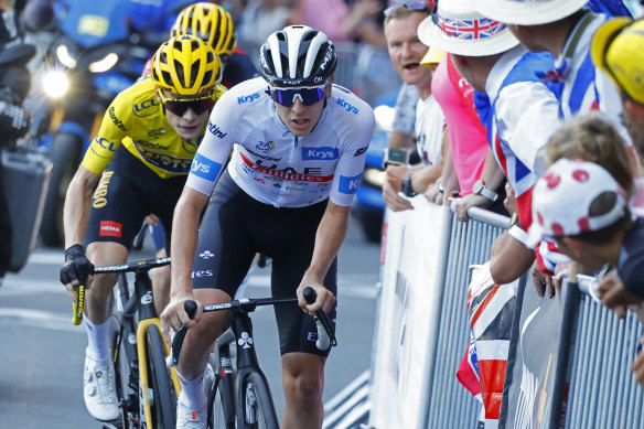 Tadej Pogacar, wearing the best young rider’s white jersey, and Denmark’s Jonas Vingegaard on the 15th stage.