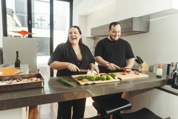 Allyssa Judd and Luke Bourke prepare a native seafood platter for Christmas.