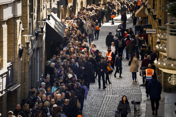 The queue stretches into Shad Thames, near the Tower Bridge.