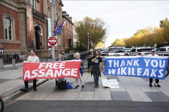 Gabriel Shipton (left) and supporters of Julian Assange standing at the corner of the road leading up to Blair House where Prime Minister Anthony Albanese stayed while visiting Washington DC this week. 