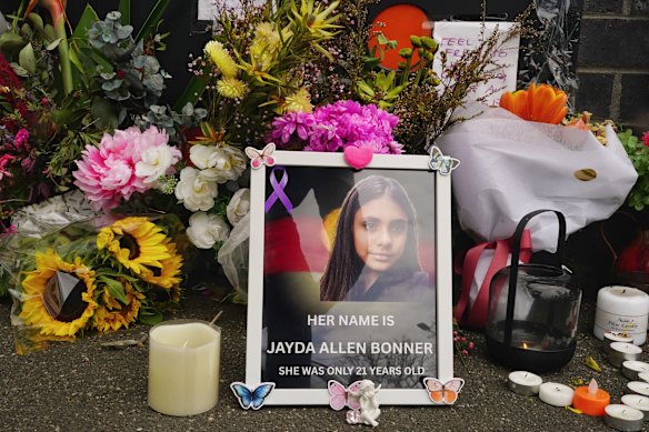 Flowers and messages at a memorial for Jayda Allen Bonner.