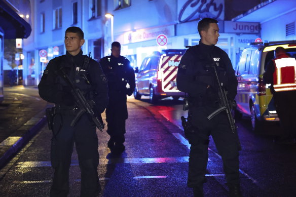 Police and ambulances near the scene of the attack at a festival in Solingen.