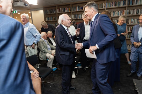 Former prime minister John Howard and Angus Taylor at the Centre for Independent Studies in February.