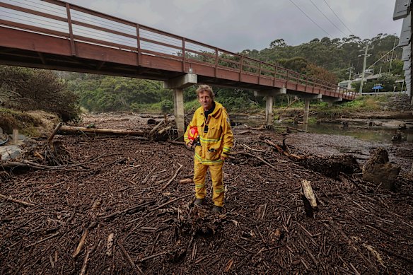 The aftermath: Wye River CFA captain Andy Hack stands near the trashed waterway. 