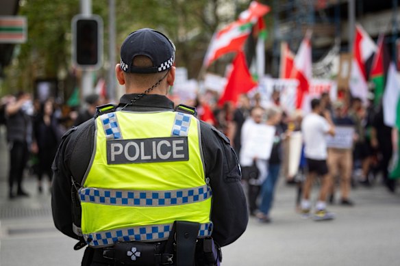 Police monitor a pro-Palestine protest in Australia.