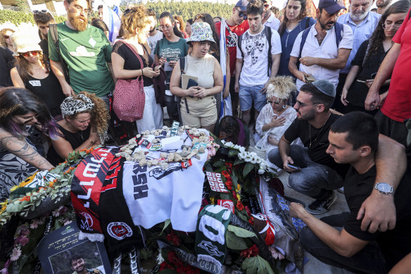 Mourners gather by the grave of Israeli-American hostage Hersh Goldberg-Polin.