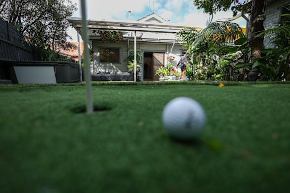 The putting green was one of several interesting features that had been added to the home over the years.