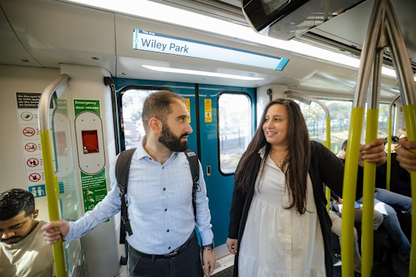 Michael Ibrahim and Jane Hajal ride the newly extended M1 Metro service.