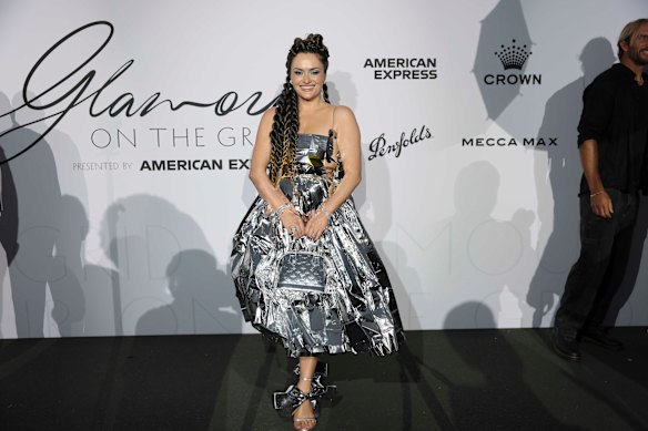 Philanthropist Anastasia Kogan used silver insulated emergency blankets as the basis for her tinsel dress.