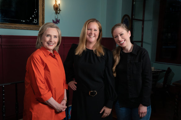 The Clintons with comedian Amy Schumer.