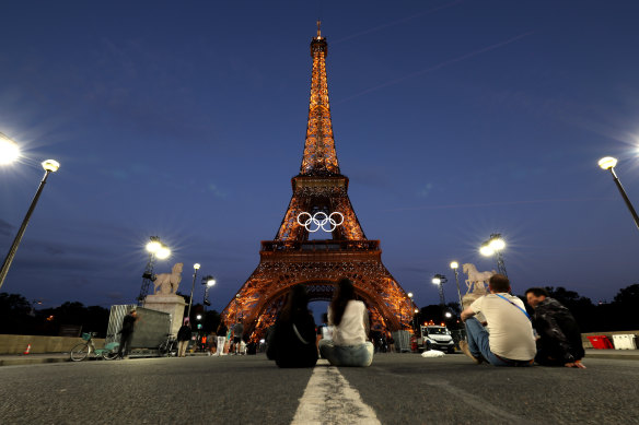 The Eiffel Tower in Paris is decorated with the Olympic rings.