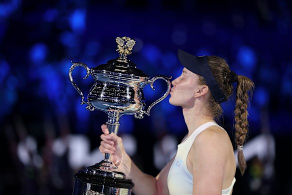 Elena Rybakina with the Daphne Akhurst Memorial Cup after defeating Aryna Sabalenka in the Australian Open women’s singles final. 
