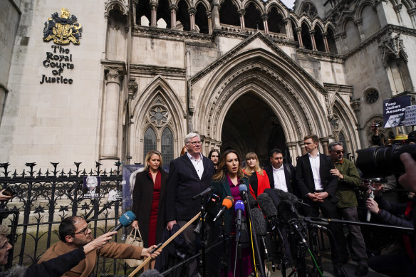 Stella Assange, wife of Wikileaks founder Julian Assange, speaks outside the Royal Courts of Justice, in London yesterday.