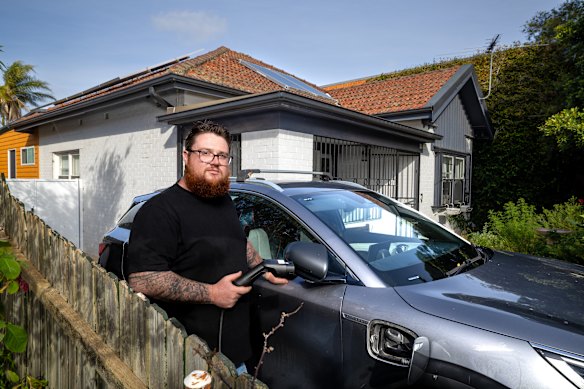 Mitch Burnie, 32, says he wouldn’t have bought an EV without federal government incentives.