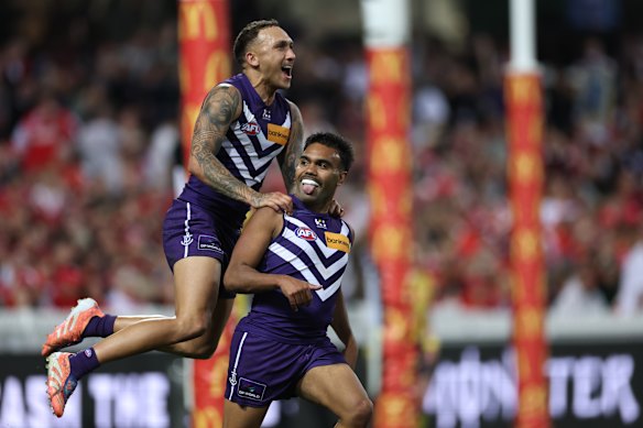 Isaiah Dudley of the Dockers celebrates with Shai Bolton after kicking a goal