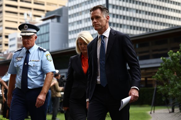 Police Commissioner Mal Lanyon, Police Minister Yasmin Catley and Premier Chris Minns respond to the report on Thursday.