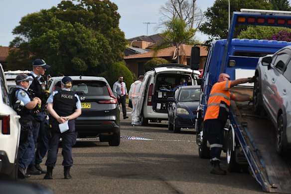A silver sedan was pulled over as police watched in Juliet Close.