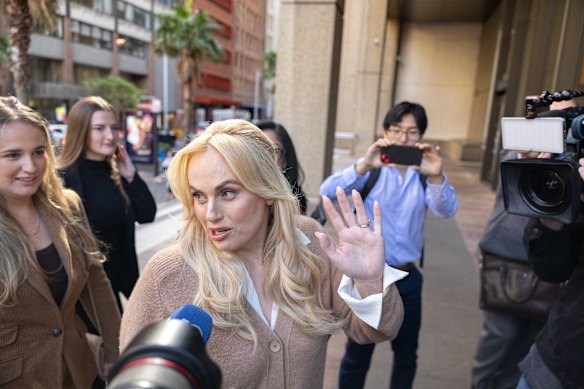 Rebel Wilson arrives at the Federal Court in Sydney on Monday for the first day of actress Charlotte MacInnes' defamation trial against him.
