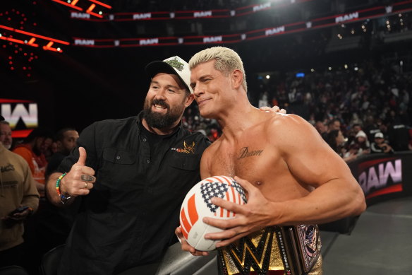 Woods with wrestler Cody Rhodes in Charlotte, North Carolina, promoting the NRL earlier this month.