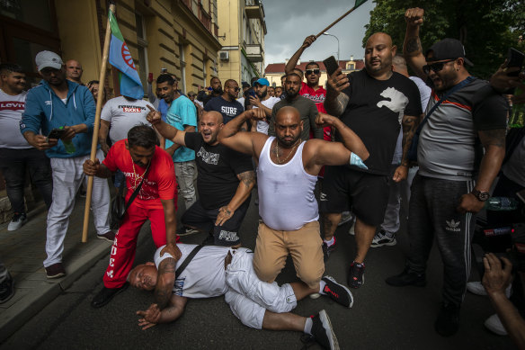 Protesters blame the death of Roma man Stanislav Tomas on police officers after a video showed one officer kneeling on the shoulders and neck of a man for several minutes.