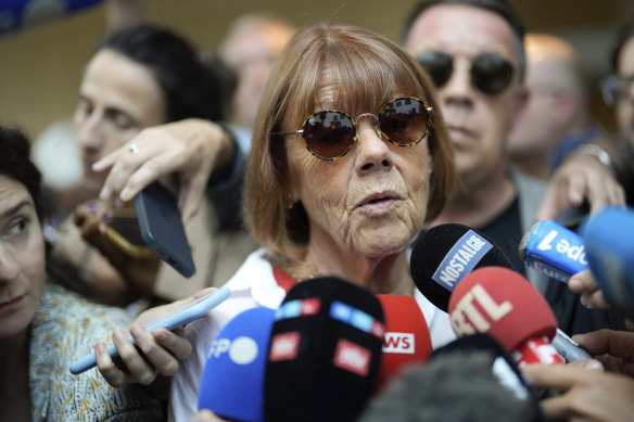 Gisele Pelicot speaks to media as she leaves the Avignon court house, southern France.