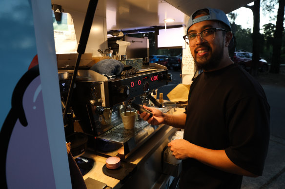 Gerome Creencia shows the set-up inside the GW Barista coffee van. 