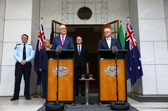 AFP Commissioner Reece Kershaw, Foreign Affairs Minister Penny Wong, ASIO Director-General Mike Burgess, Home Affairs Minister Tony Burke and Prime Minister Anthony Albanese at Parliament House on Tuesday.