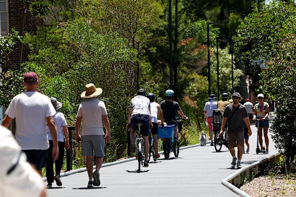 People walking and cycling along the Dulwich Hill section of the GreenWay.